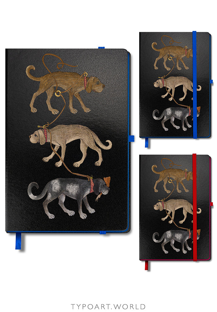 Notebooks with dog illustrations on black covers, featuring blue, red ribbons.